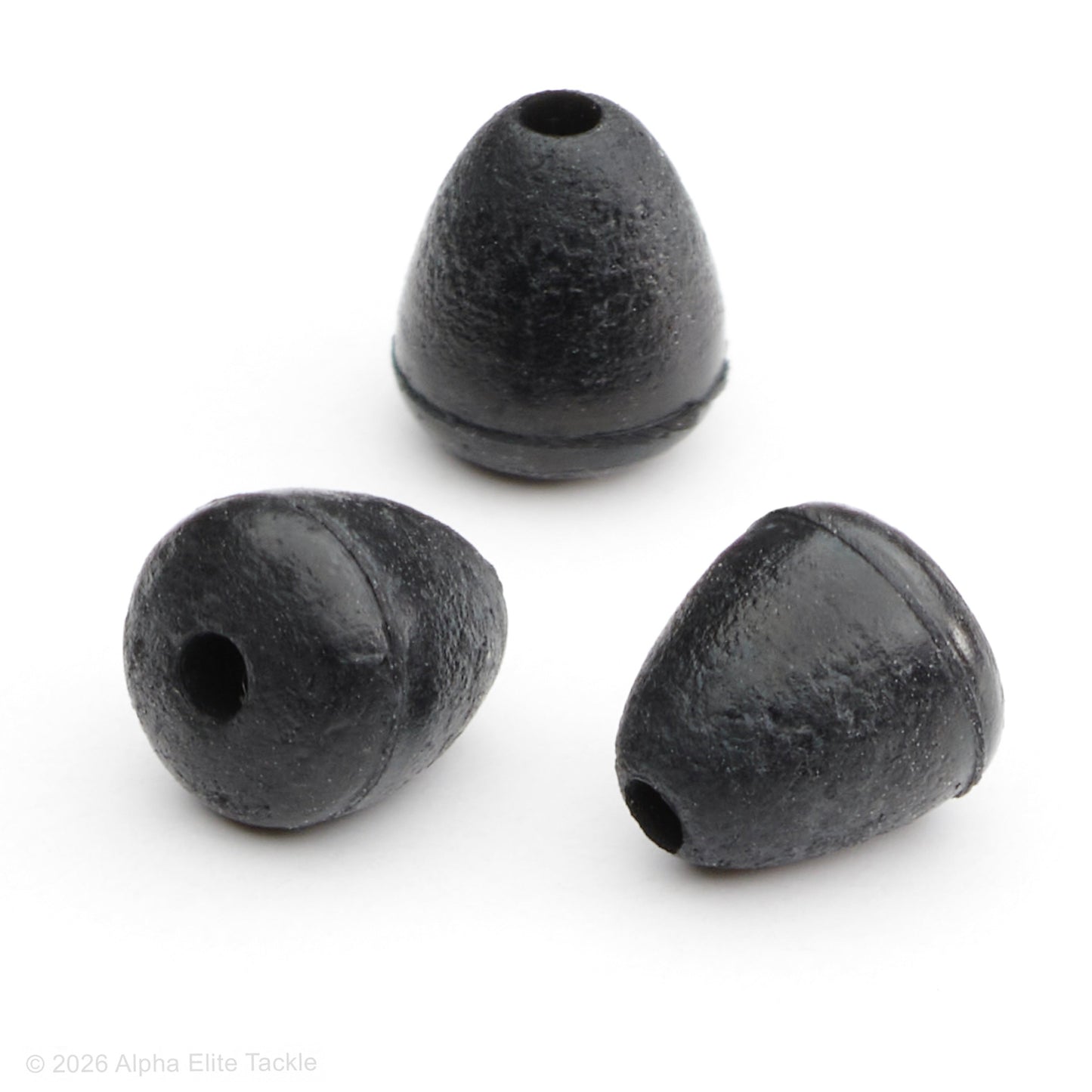 Three black rubber fishing stoppers on a white background