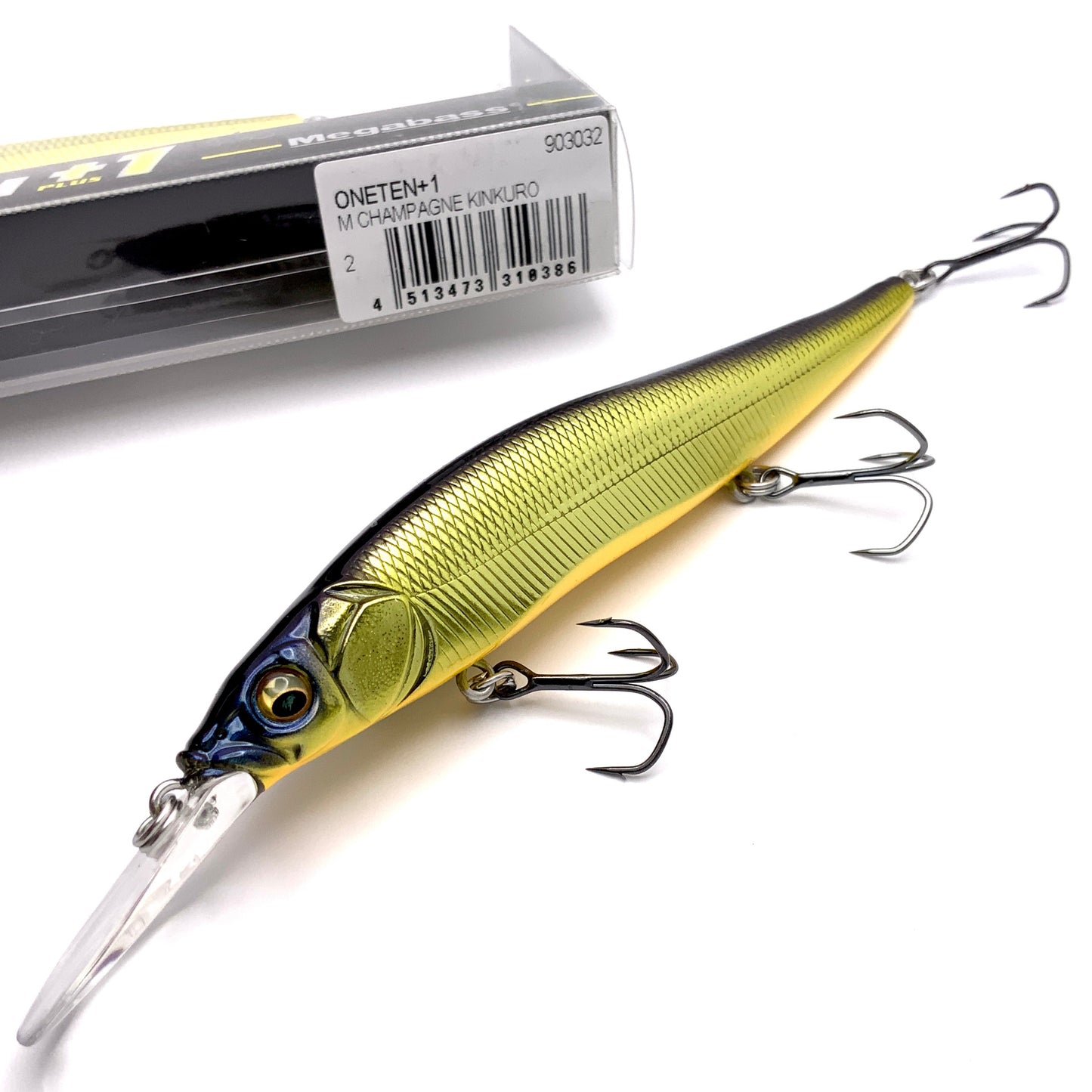 Megabass Ito Vision Oneten plus one Jerkbait in the color M Champagne Kinkuro on a white background