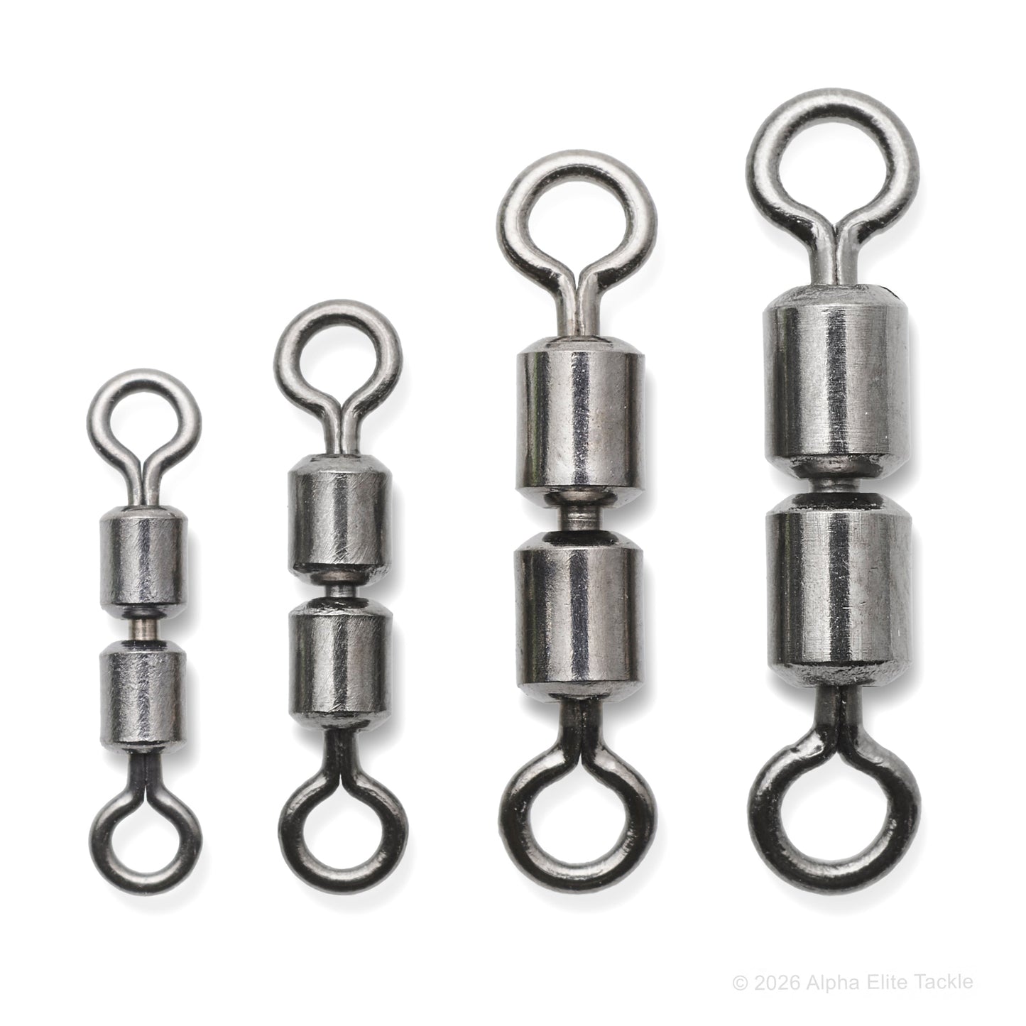 Four metal fishing swivels on a white background