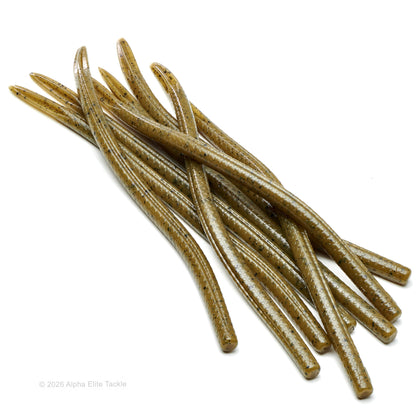Close-up of multiple green pumpkin finesse worms with black flake on a white background.