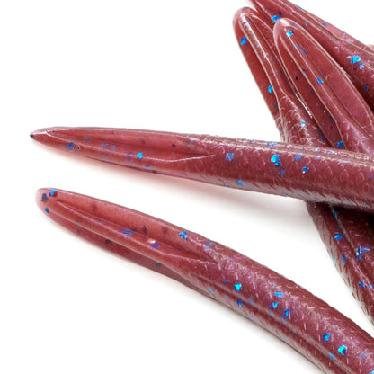 Close-up of the tail of the Alfheid Quick Dance ST Finesse worm on a white background