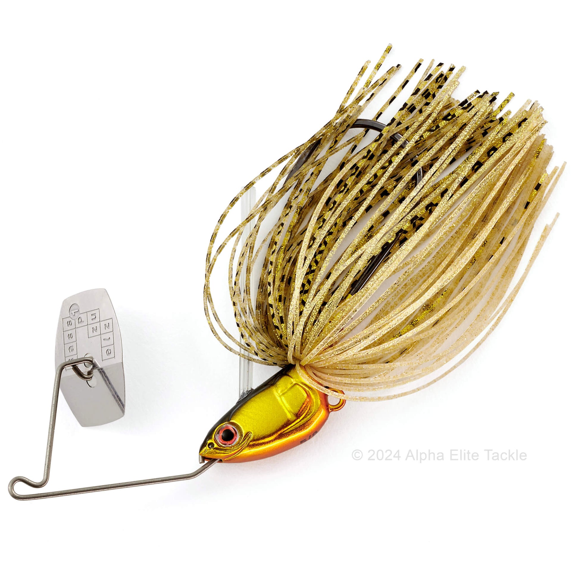 Close up of the Bass Puzzle Grass Piece Flex Bladed Swim jig in the color Gold Shiner on a white background