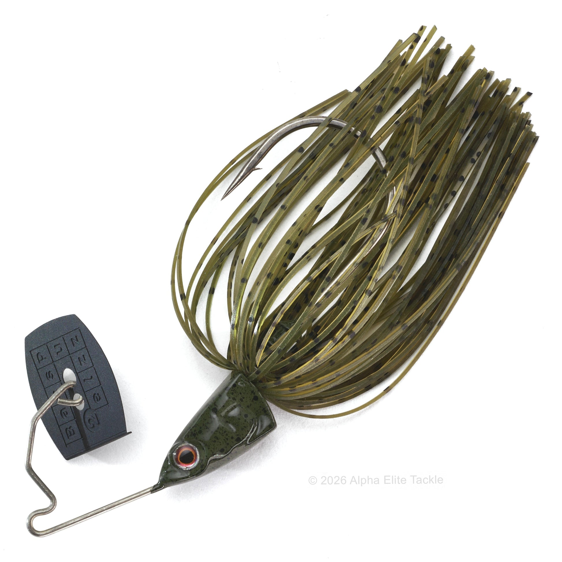 Close up of the Bass Puzzle Grass Piece bladed swim jig in the color Green Pumpkin on a white background