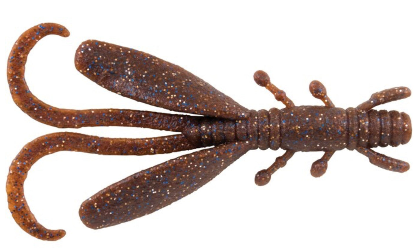Brown and speckled fishing lure on a white background