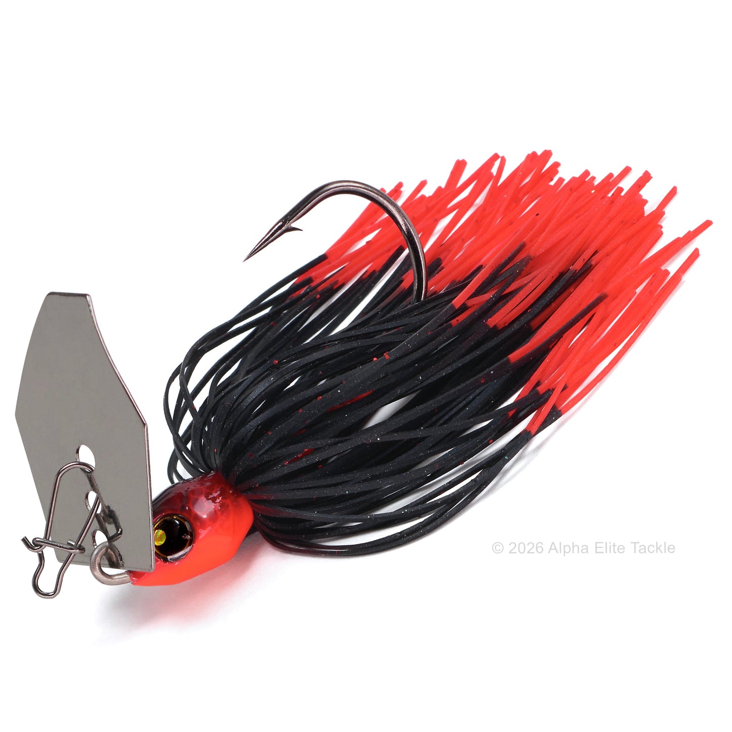 Close up of the Bumblebee Custom Lures B Blade Bladed jig in the color Spring Crimson on a white background.
