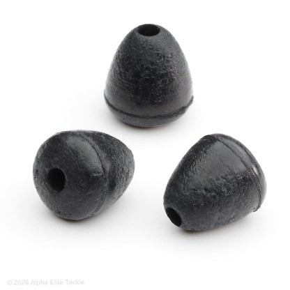 Three black rubber fishing stoppers on a white background