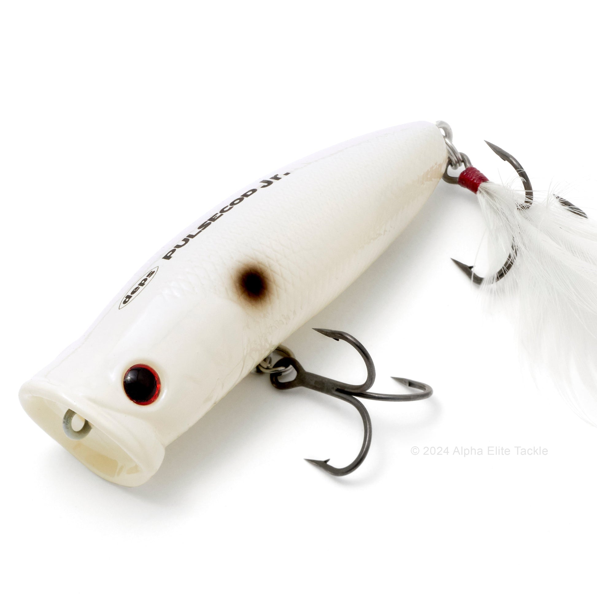 Close up of the Deps Pulsecod Topwater Popper in the color Bone Shad on a white background