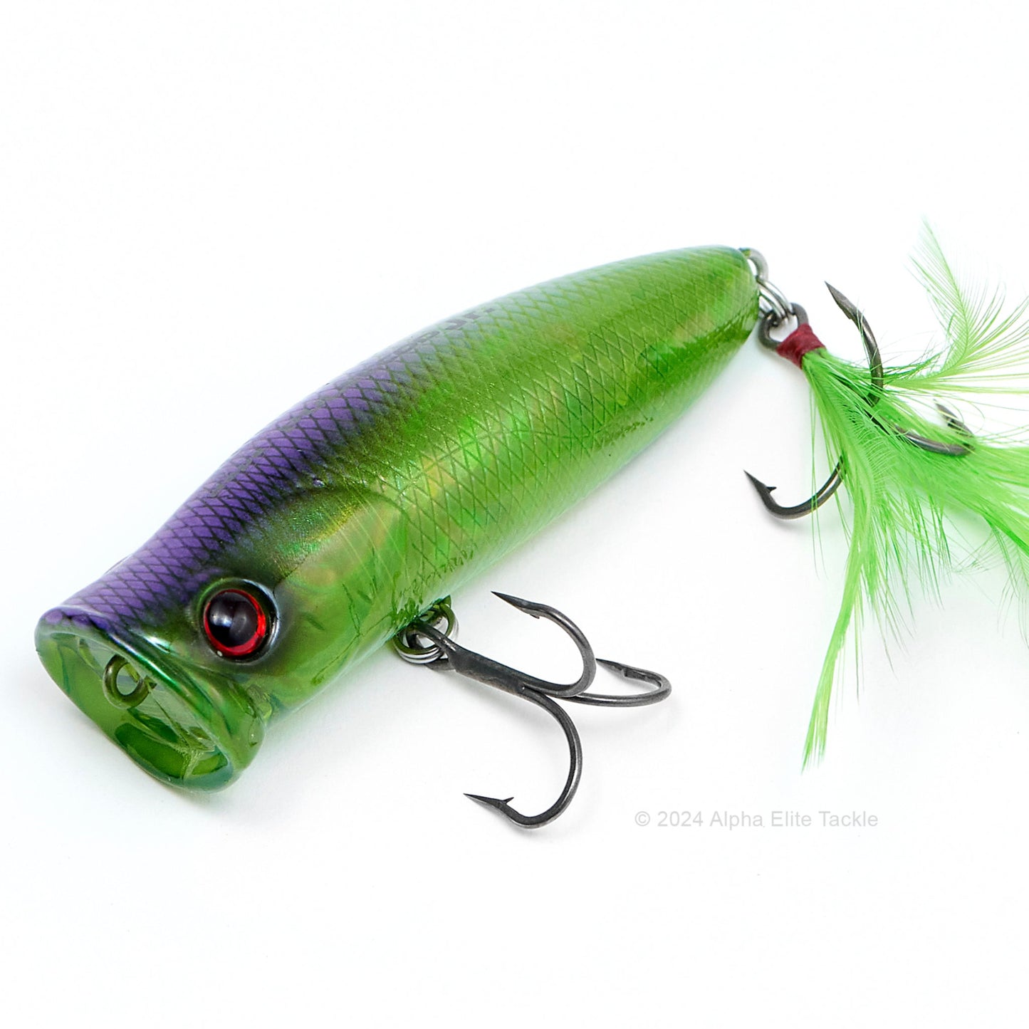 Close up of the Deps Pulsecod Topwater Popper in the color Purple Weenie on a white background