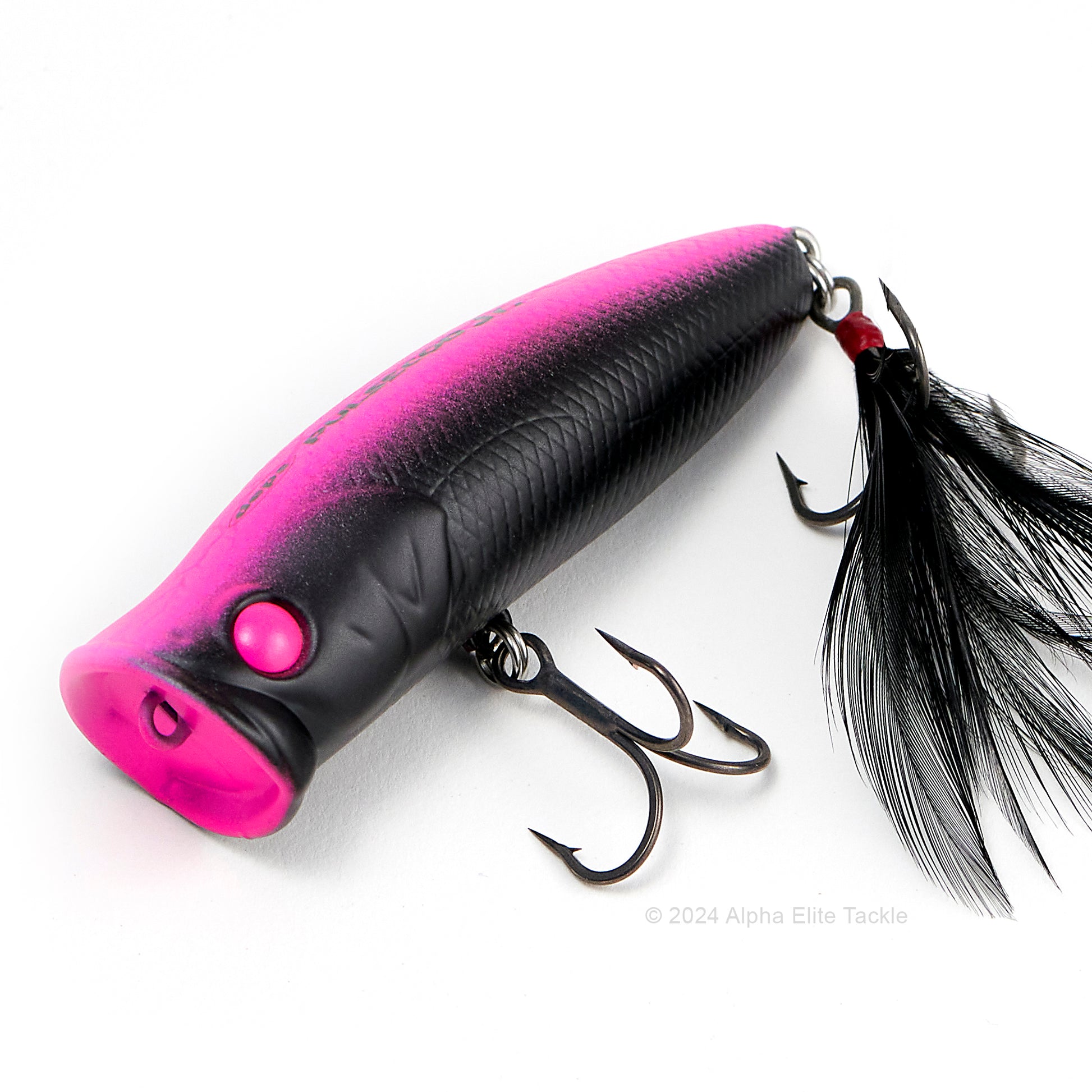 Close up of the Deps Pulsecod Topwater Popper in the color Visible Black on a white background