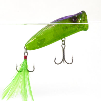 Close up of the Deps Pulsecod Topwater Popper in water floating on a white background