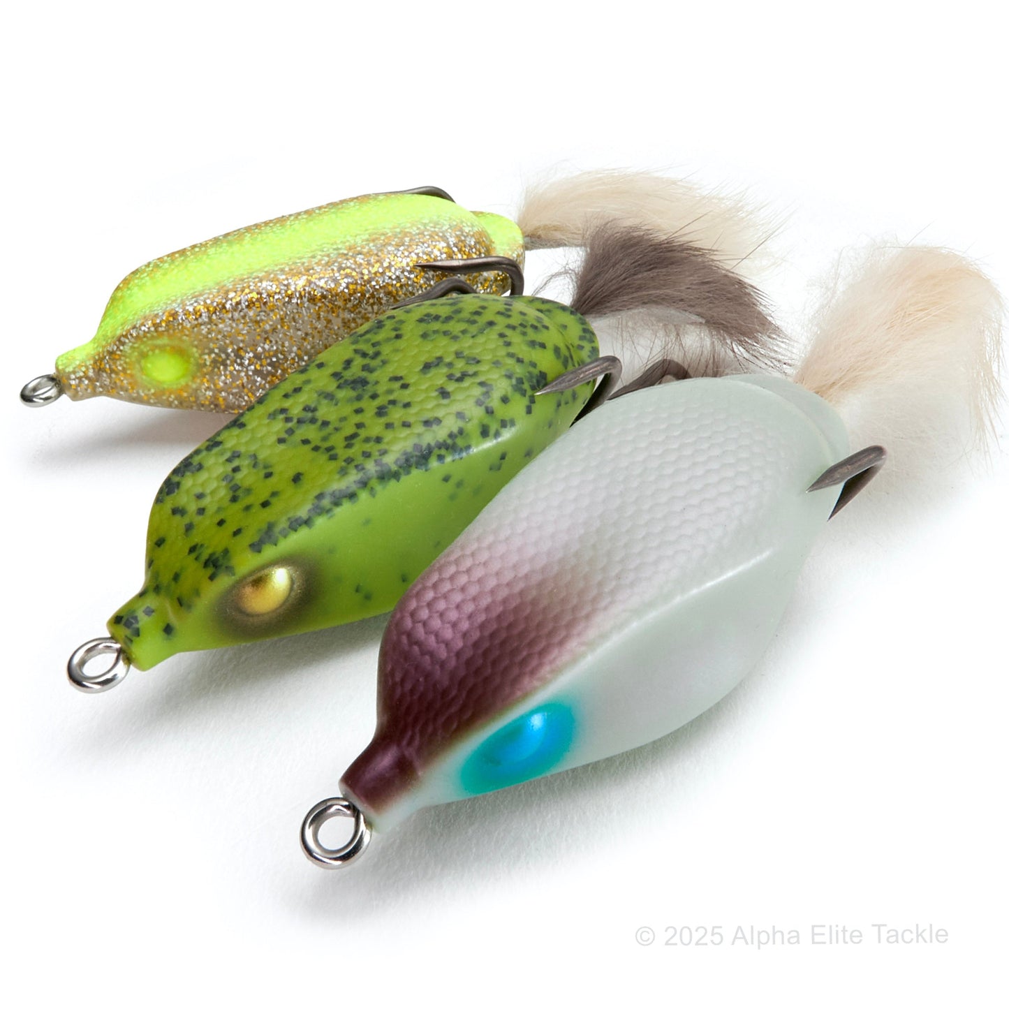 Close up of three Deps Slither K Hollow Body Frogs out of their package on a white background.