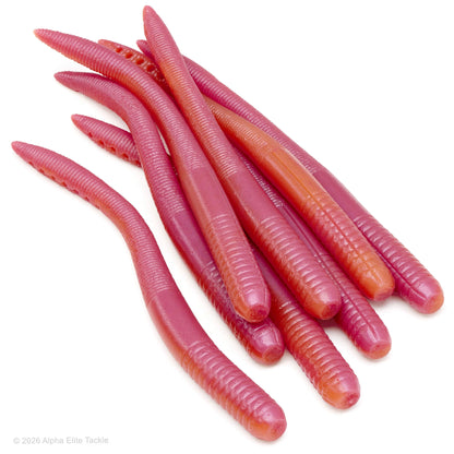 A pile of translucent pink and orange EZ Lab's Shakin Tail worms with ribbed bodies, arranged on a clean white background.