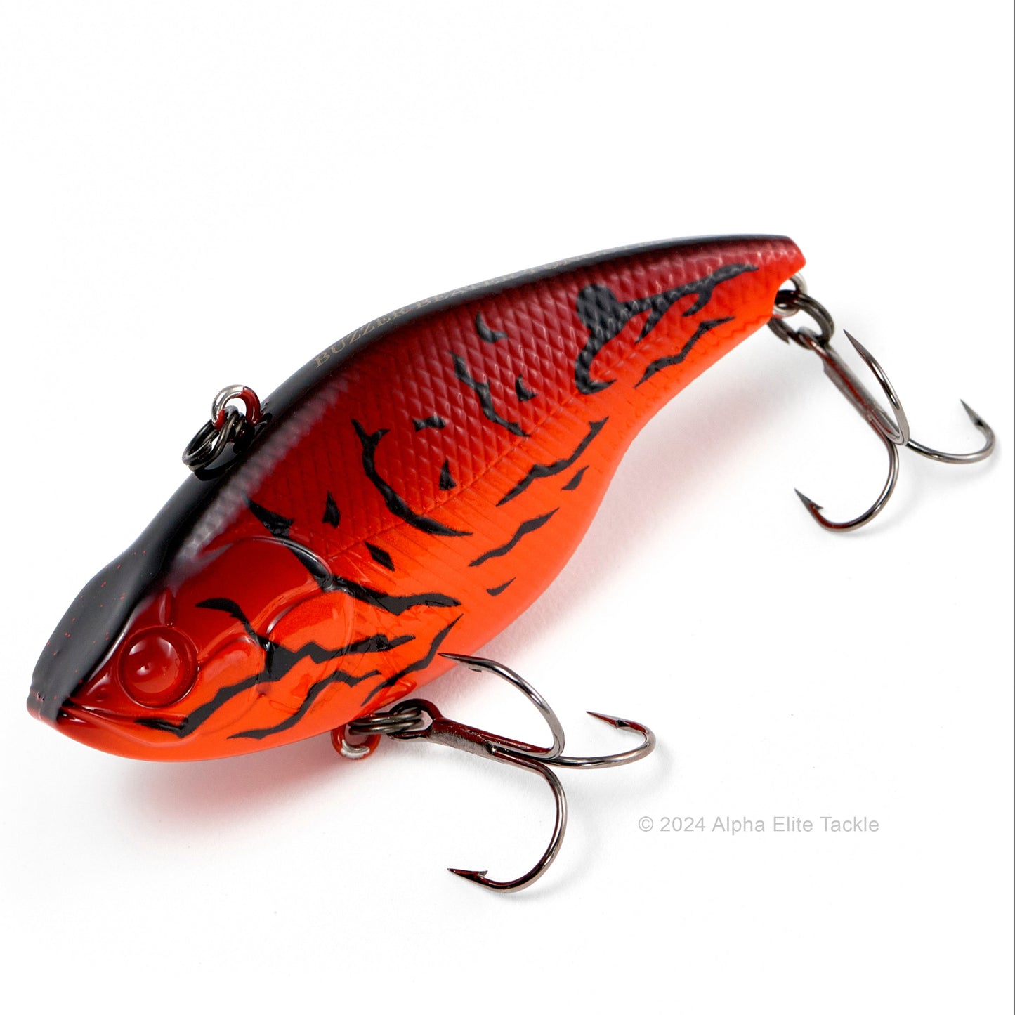 Close up of the Evergreen Buzzer Beater Tungsten Lipless Crankbait fishing lure in the color Fire craw on a white background