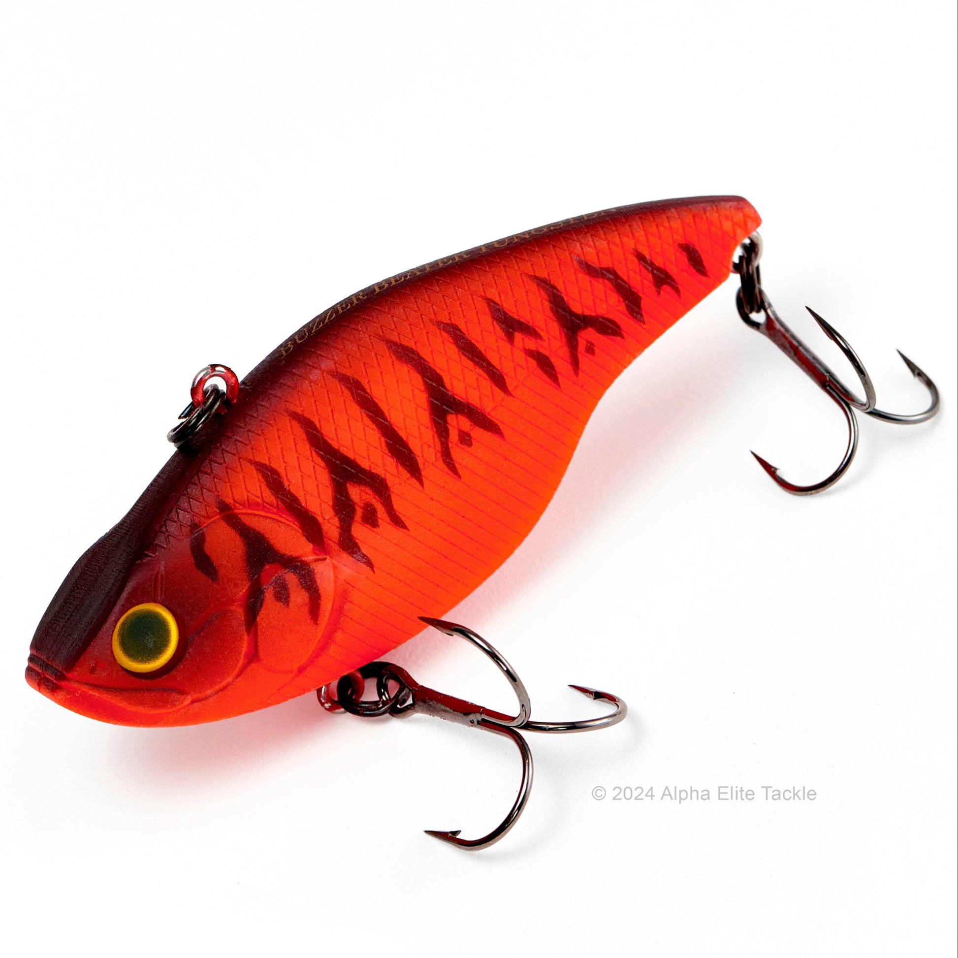 Close up of the Evergreen Buzzer Beater Tungsten Lipless Crankbait fishing lure in the color Fujiki Tiger on a white background