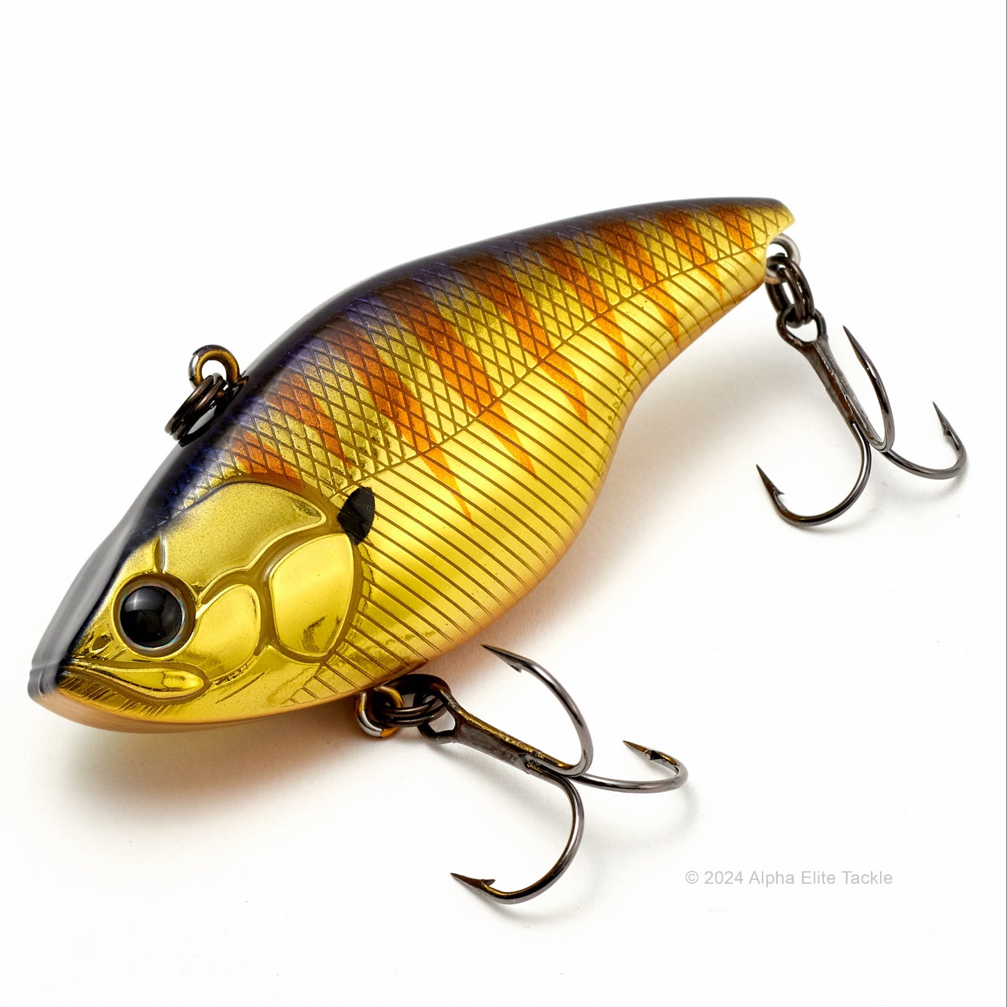 Close up of the Evergreen Buzzer Beater Tungsten Lipless Crankbait fishing lure in the color OK Gold on a white background