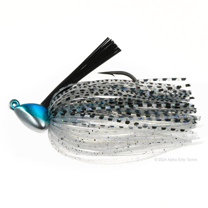 Close up of one Evergreen Grass Ripper Jig in the color Natural Shad on a white background.