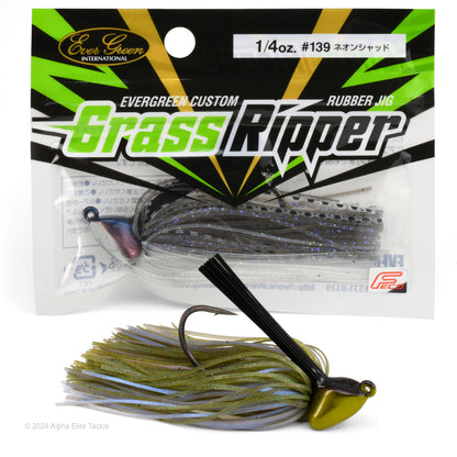 Close up of one Evergreen Grass Ripper Jig and its packaging on a white background.