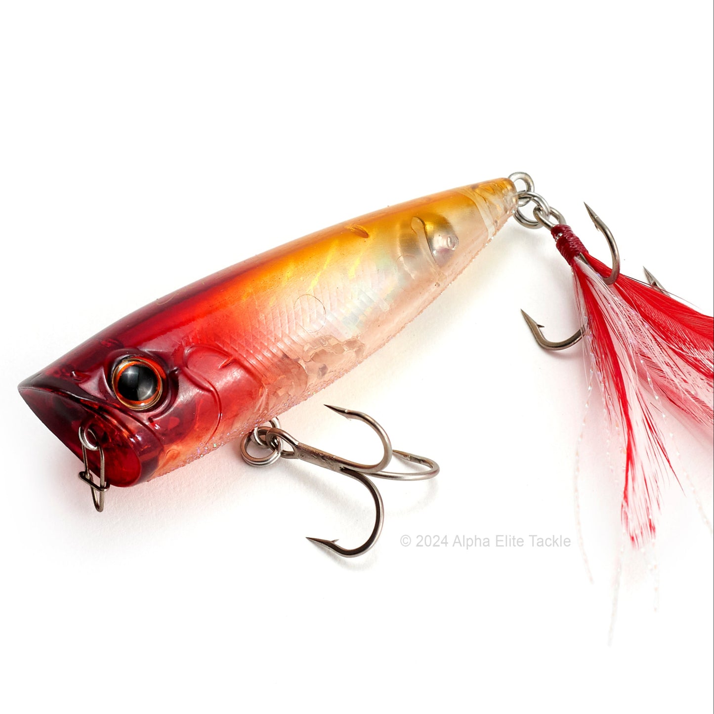 Close up of the Evergreen Ones Bug OB-68 Topwater Popper in the color Flash Clown on a white background