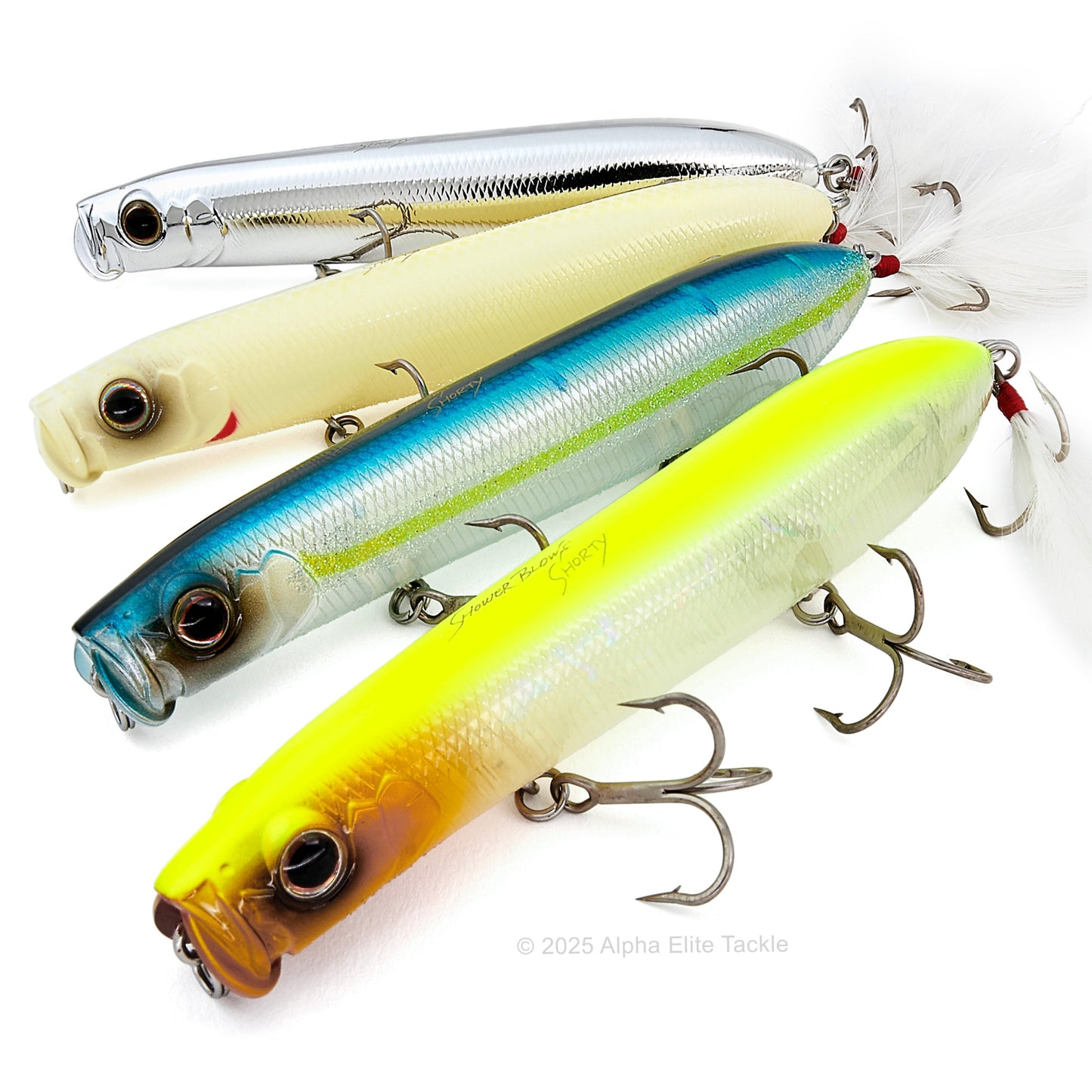 Close up of four Evergreen Showerblows Shorty SB-105 Topwaters on a white background