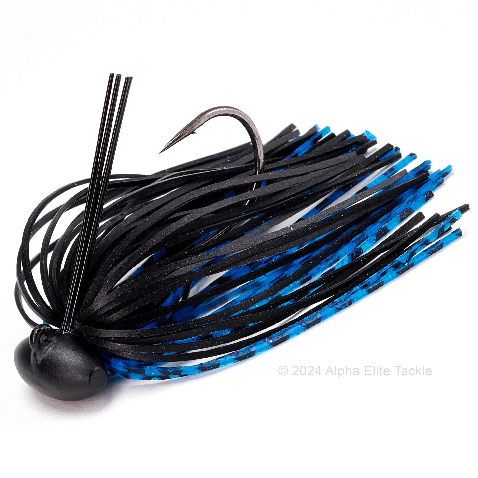 Close up of one Evergreen Tungsten Blow Football Jig in the color Black Blue on a white background.