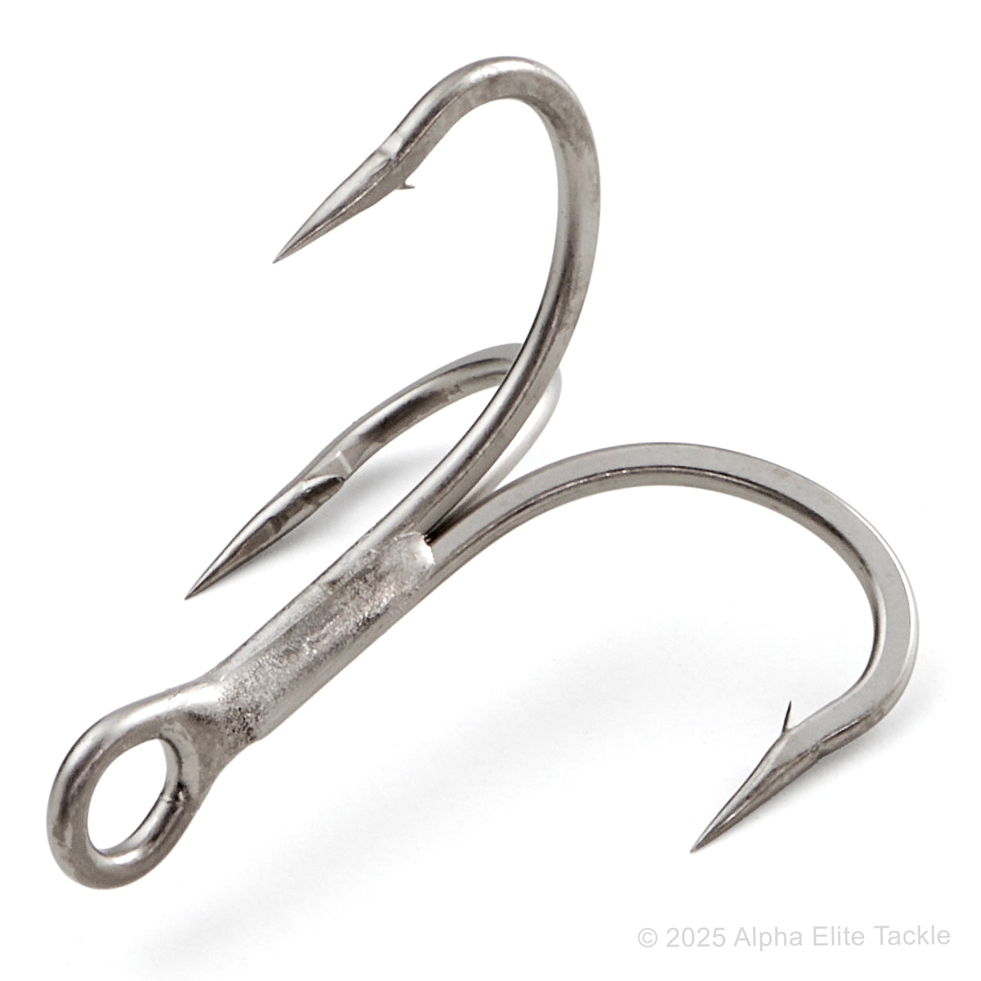 Close up of one Evergreen Treble Magic Hook on a white background