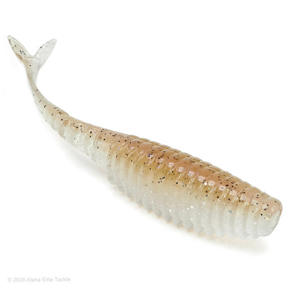 A translucent soft plastic fishing lure shaped like a small baitfish, shown on a clean white background. The lure has a pale, milky body with a warm peach-tan flash and fine black glitter throughout.