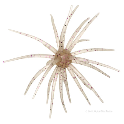 A translucent white fishing lure with multiple long, thin rays and a pale pink center, shown on a plain white background. A small copyright watermark for Alpha Elite Tackle is visible in the bottom right corner.
