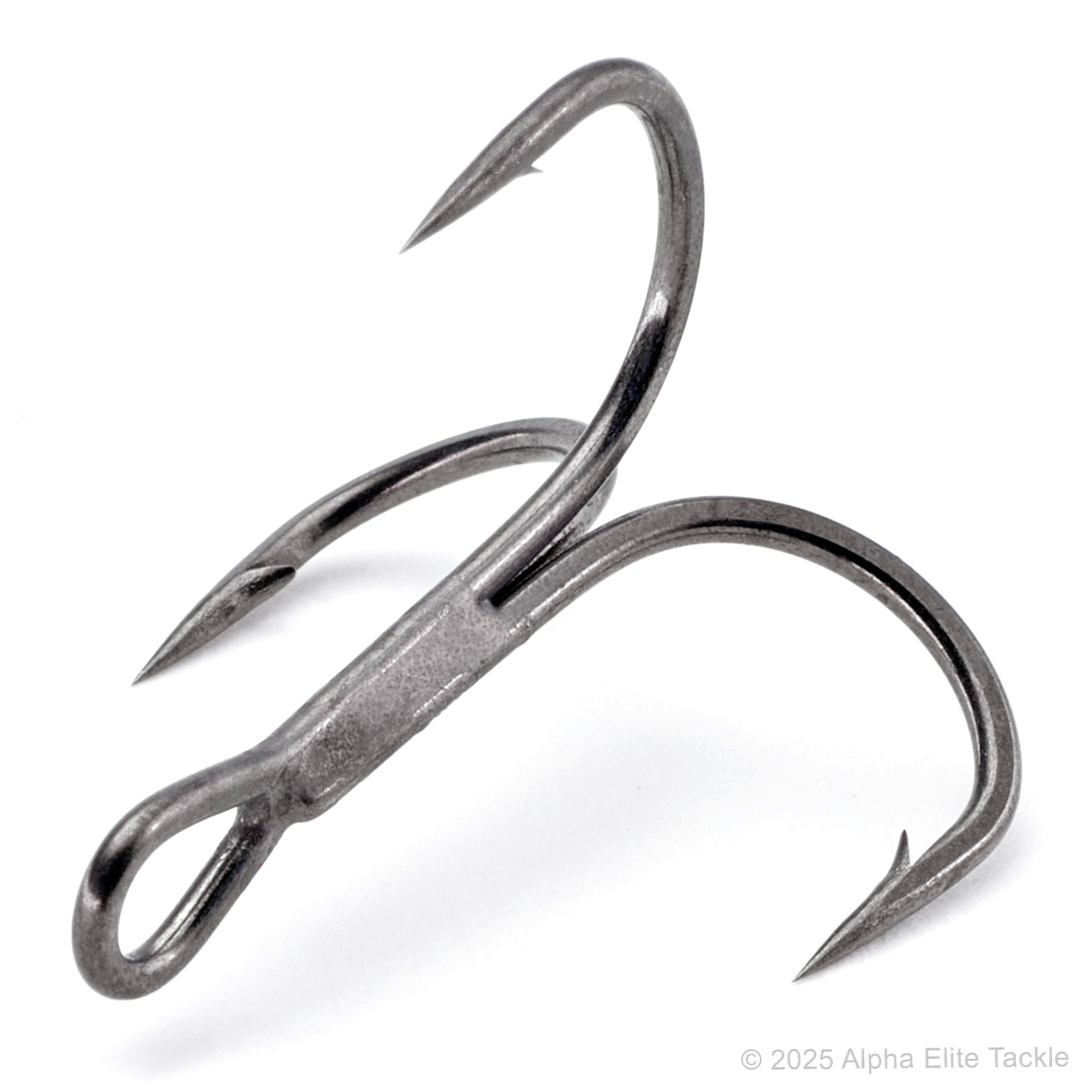 Close up of a single ichikawa light treble hook on a white backfground