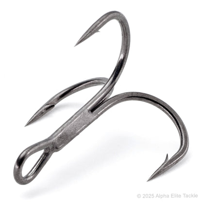 Close up of a single ichikawa light treble hook on a white backfground