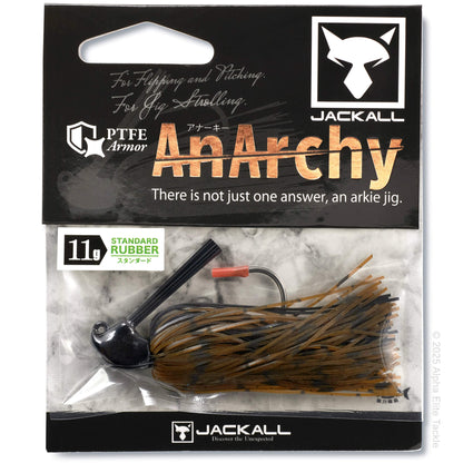 Close up of one Jackall Anarchy Flipping Jig Brown Black in it's package on a white background.