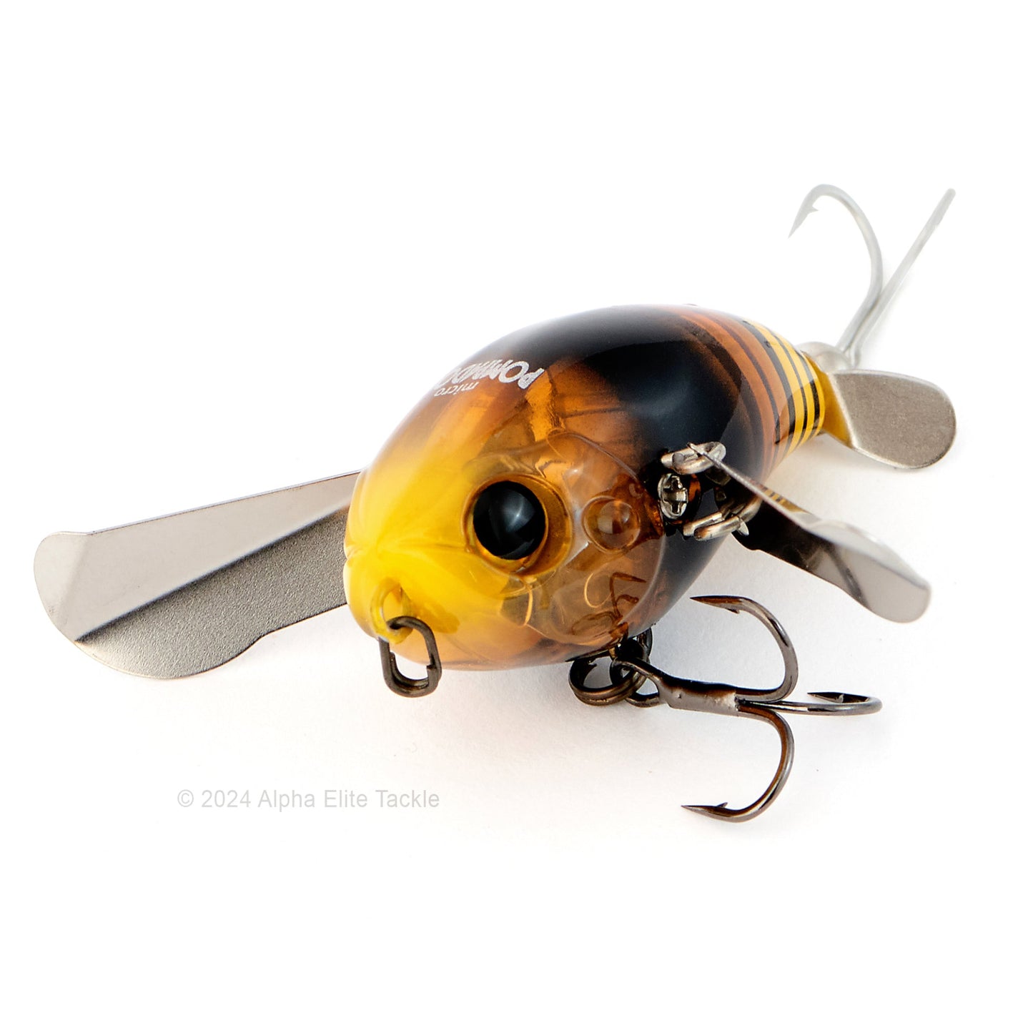Close up of the Jackall Micro Pompadour Topwater Crawler in the color Dokunasis Hornet on a white background