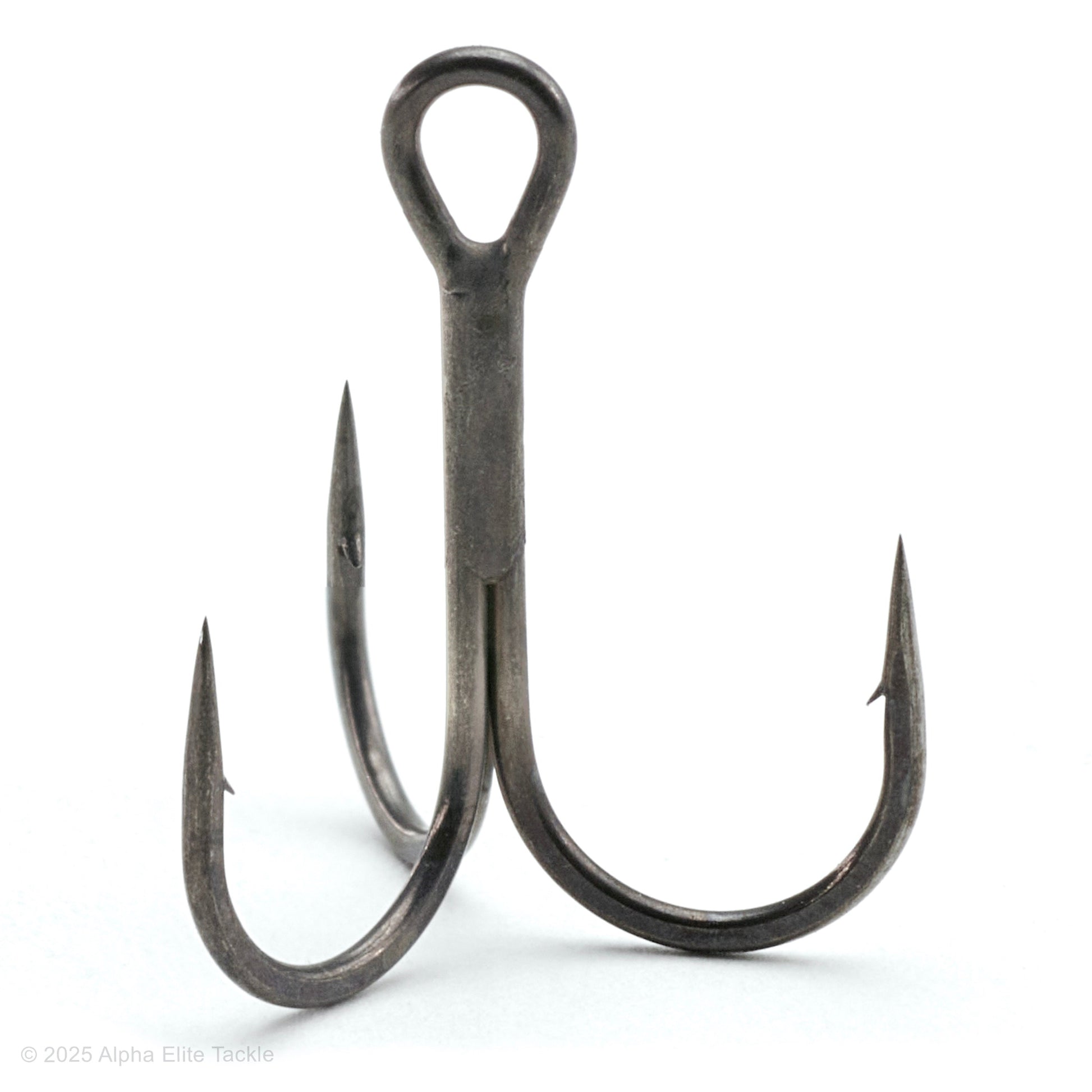 close up of the jackall treble r treble hook out of the package on a white background