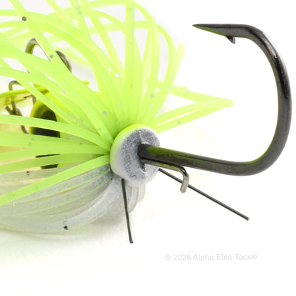 Close up of the hook of the Jackall Derabreak Bladed Jig on a white background