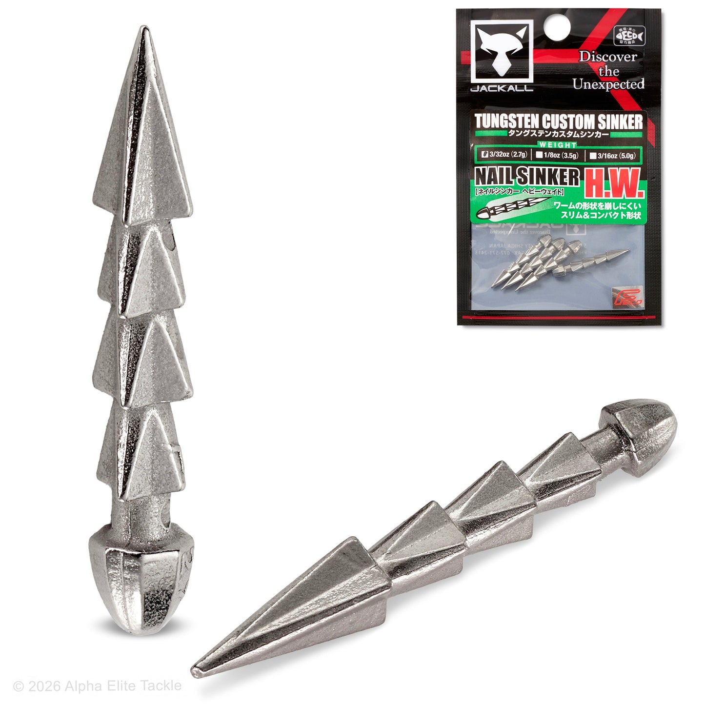 Two metal Nailsinker HW fishing sinkers with a Jackall packaging in the background.