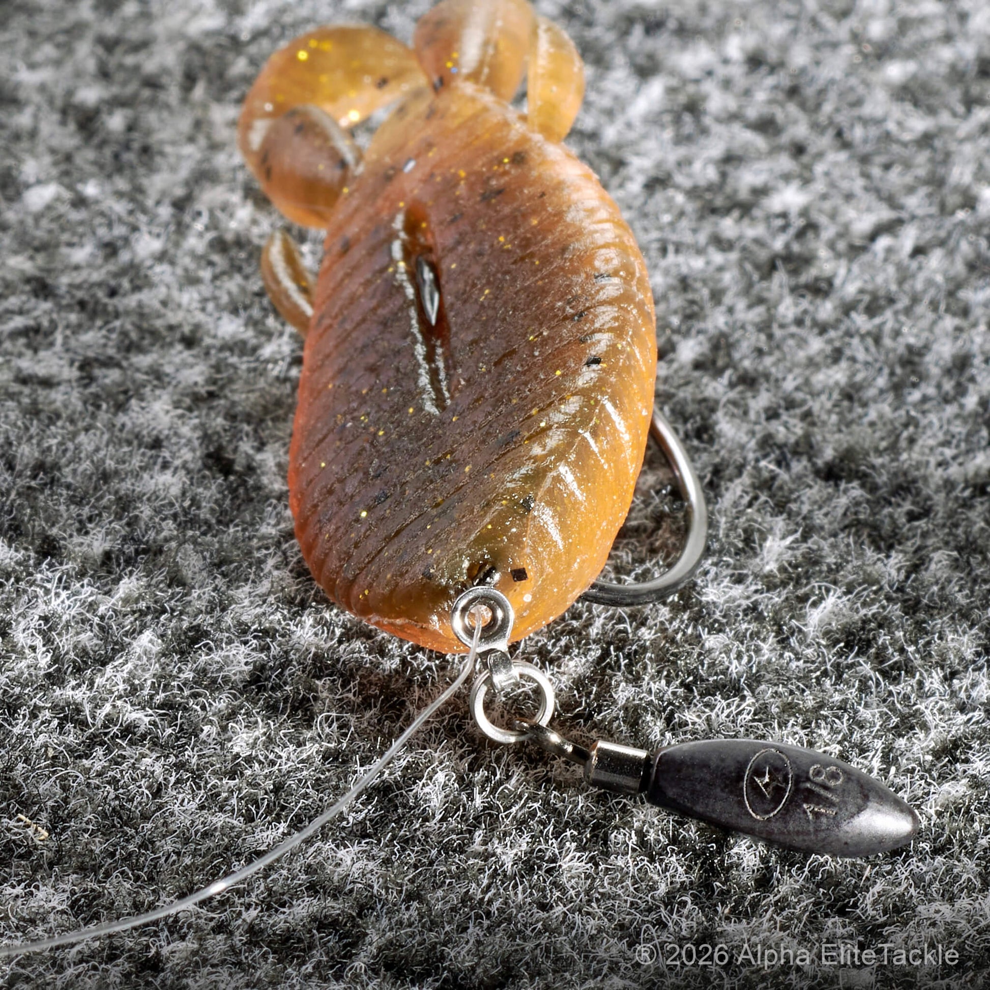 Close up of the Jackall Honey Nugget rigged on a free rig sitting on boat carpet/