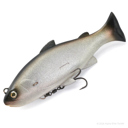 A realistic fishing lure shaped like a fish, shown on a plain white background. The lure has a metallic silver body with a dark gray to black head and tail, a yellow-and-black eye.
