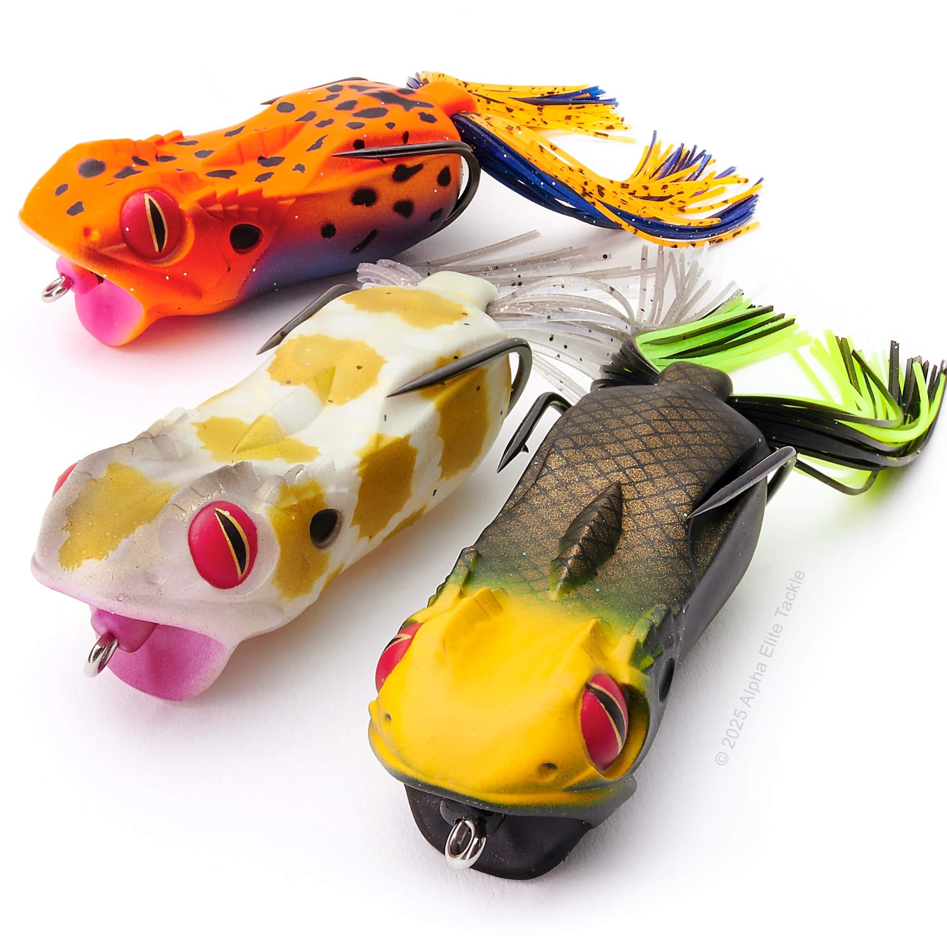 Close up of three of the Megabass Gabarin Hollow Body Popping Frog on a white background