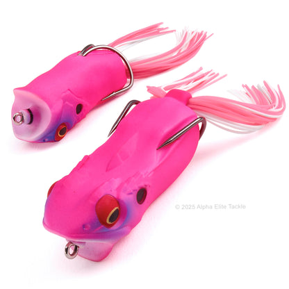 Close up of the Megabass Gabarin Hollow Body Popping Frog in the color Killer Pink on a white background