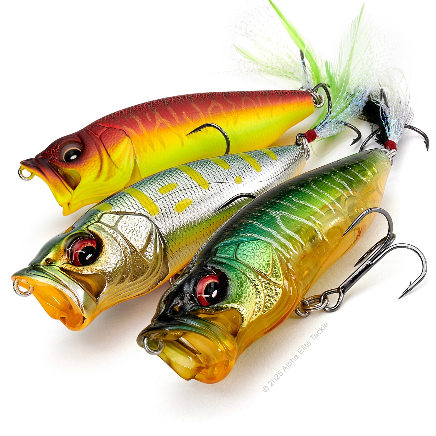 Close up of three Megabass Popmax Topwater Poppers on a white background