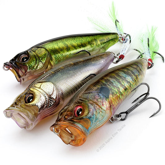 Close up of three Megabass Popmax Topwater Poppers on a white background