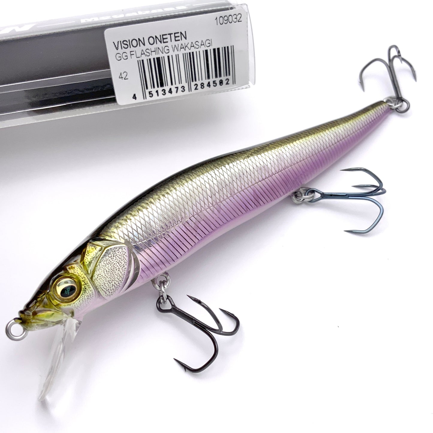 Megabass Ito Vision Oneten Jerkbait in the color GG Flashing Wakasagi on a white background