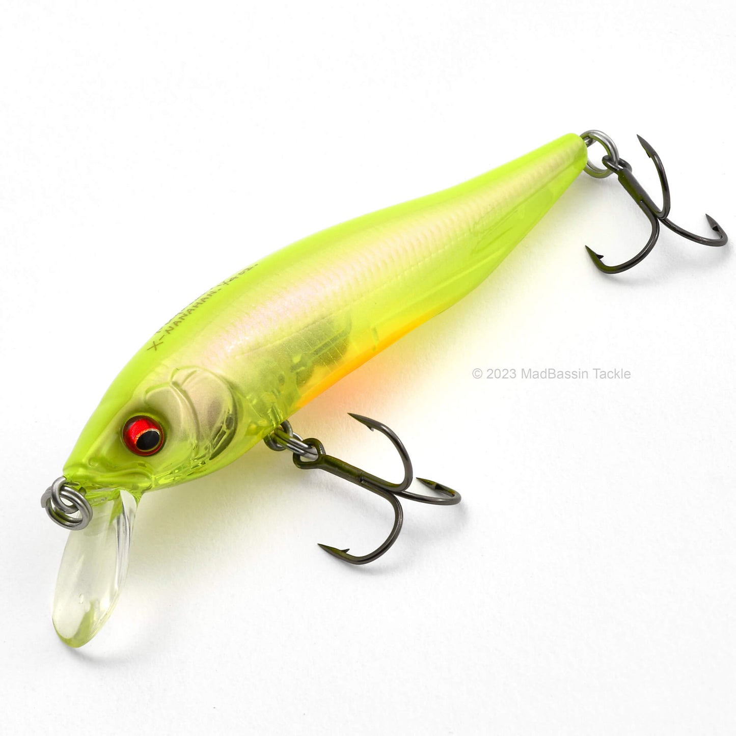 Close up of the Megabass X-75 Series X-Nanahan Jerkbait in the color GP Ito Kinari on a white background.
