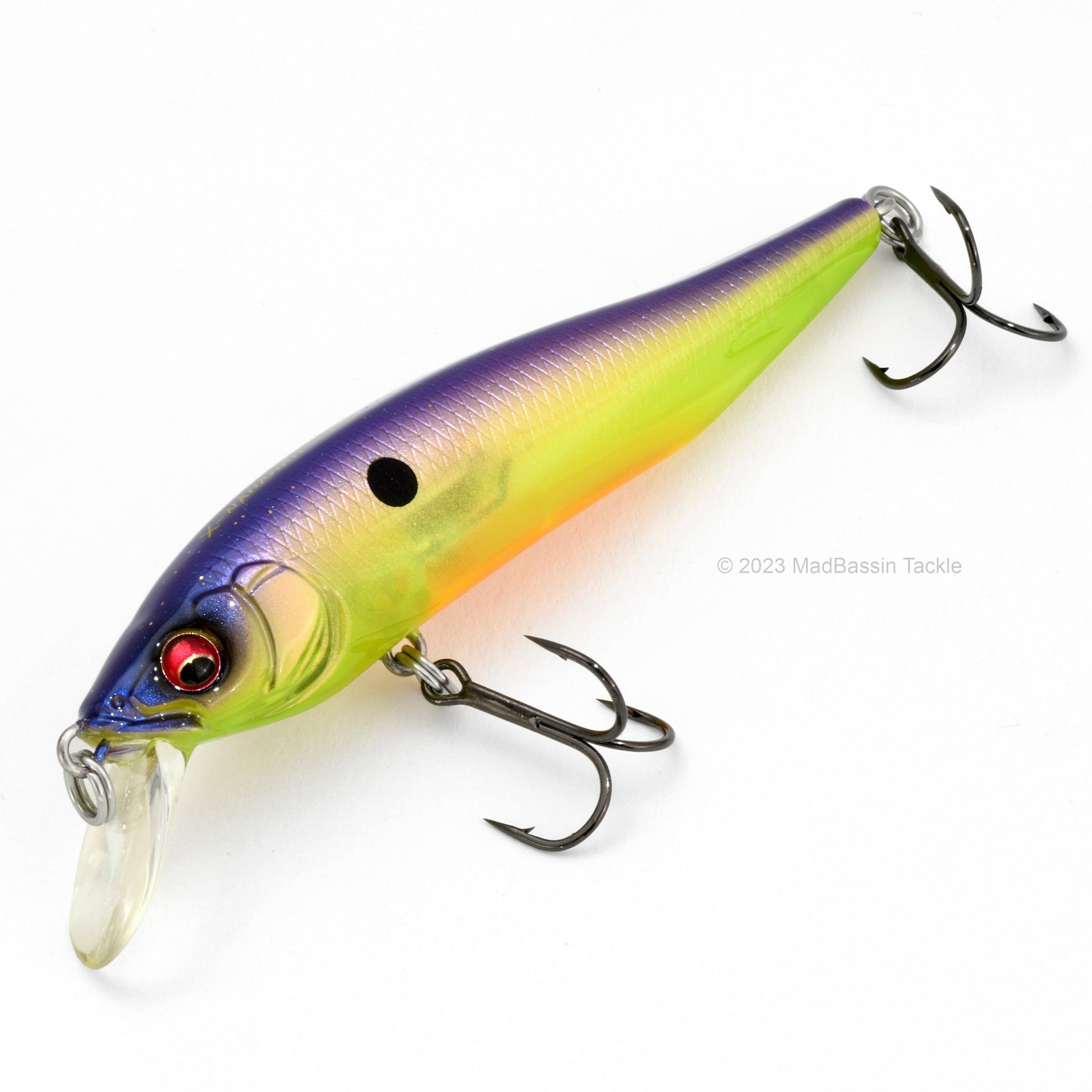 Close up of the Megabass X-75 Series X-Nanahan Jerkbait in the color Sexy Monroe on a white background.