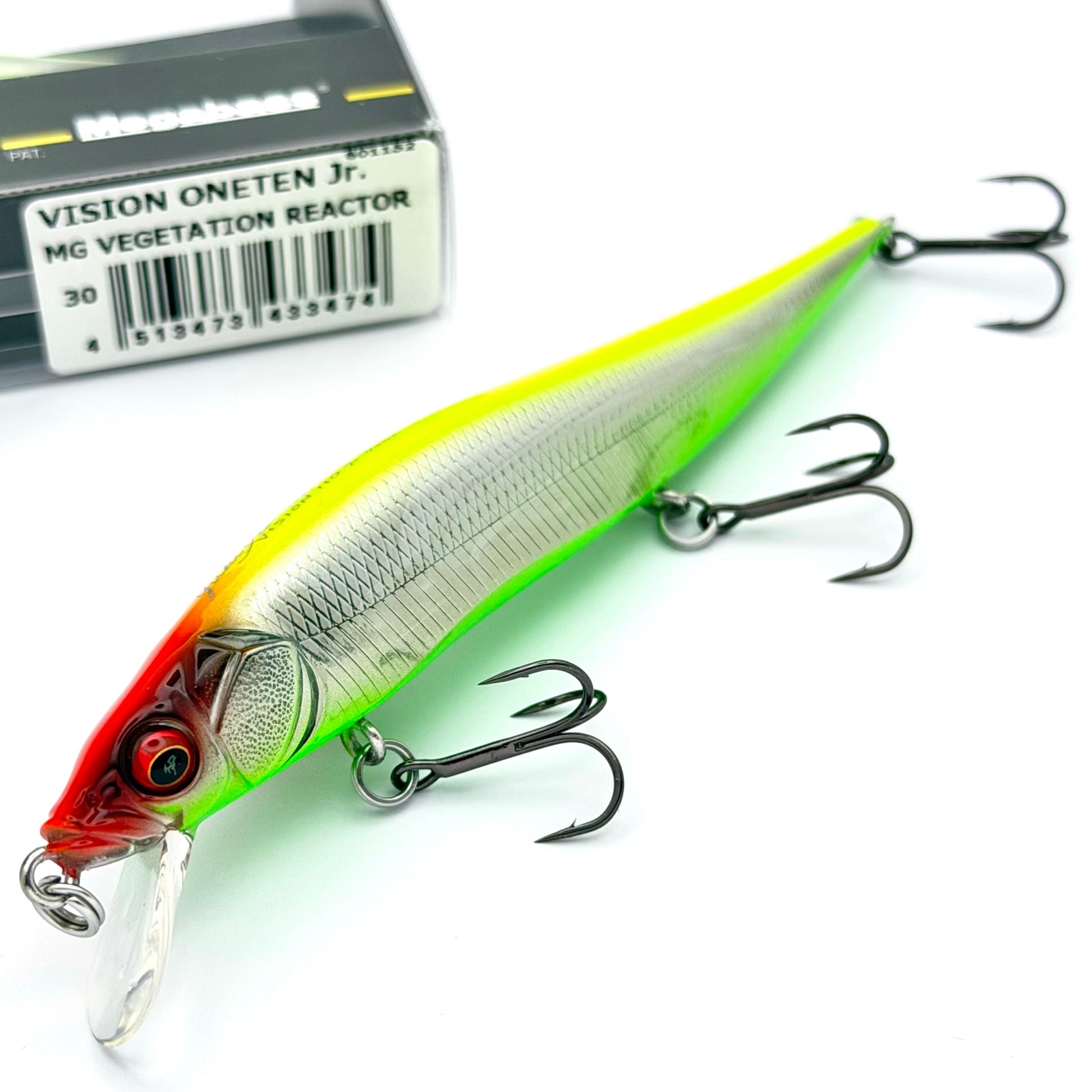 Fishing lure with hooks on a white background, featuring a Vision OneTen Jr. packaging.