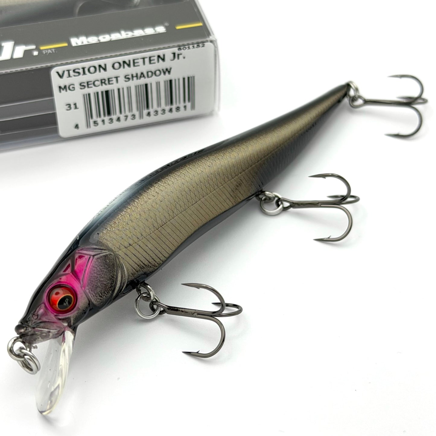 Close up of the Megabass vision oneten junior in the color mg secret shadow on a white background