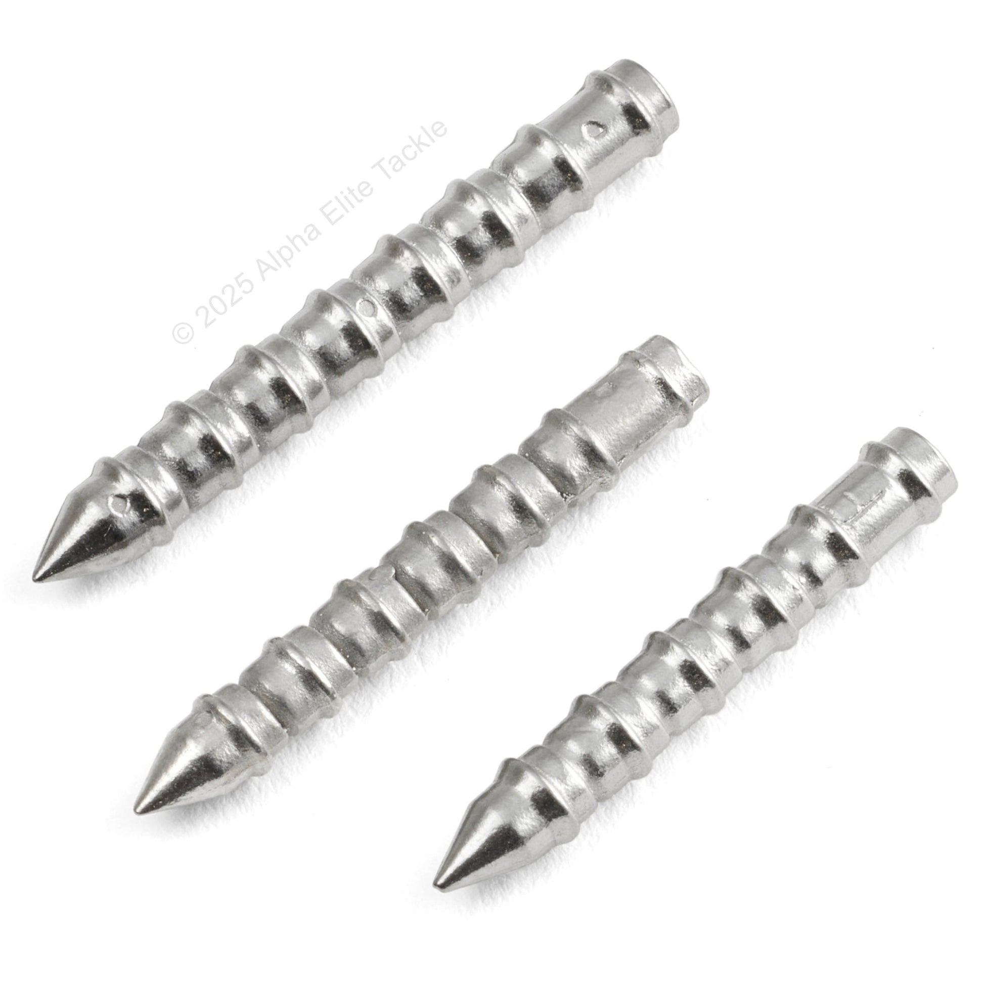 close up of 3 NOIKE Tungsten Nail Sinkers on a white background