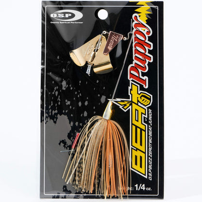 Close up of the OSP Buzz Zero Two Beat Junior Puppy Buzzbait in the color Killer Gold on a white background