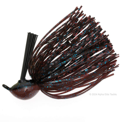 Close up of one OSP Zero One Jig in the color Dark Cinnamon Blue Flake on a white background.
