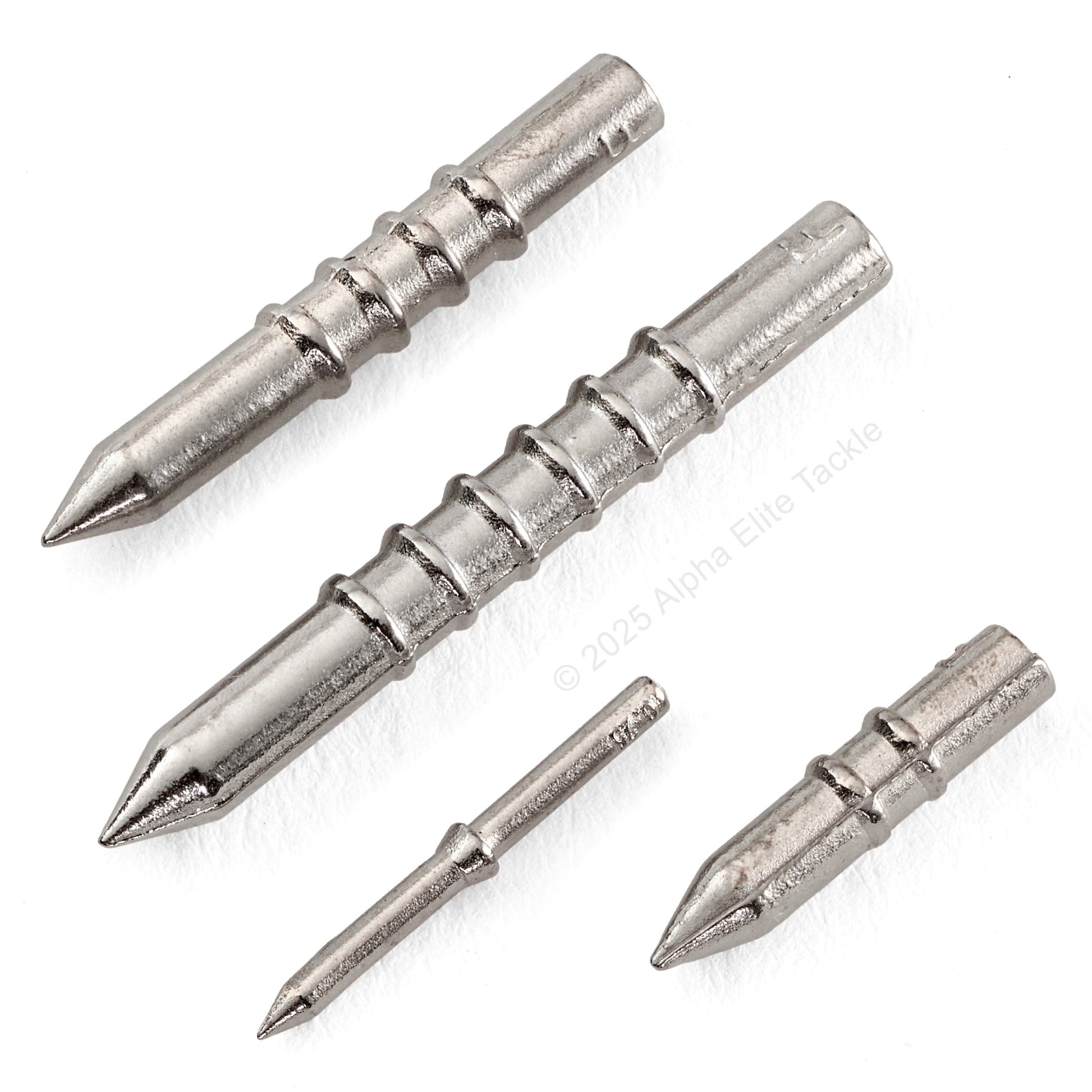 Close up of 4 reins tungsten nail sinkers on a white background