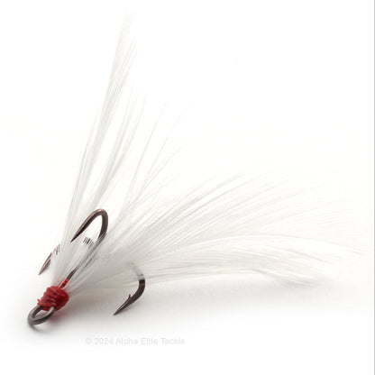 Close up of Ryugi Feathered Pierce TC Treble hook with white feathers on a white background